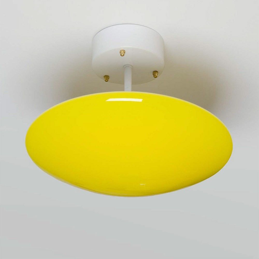 yellow sun wall / ceiling light by atelier areti