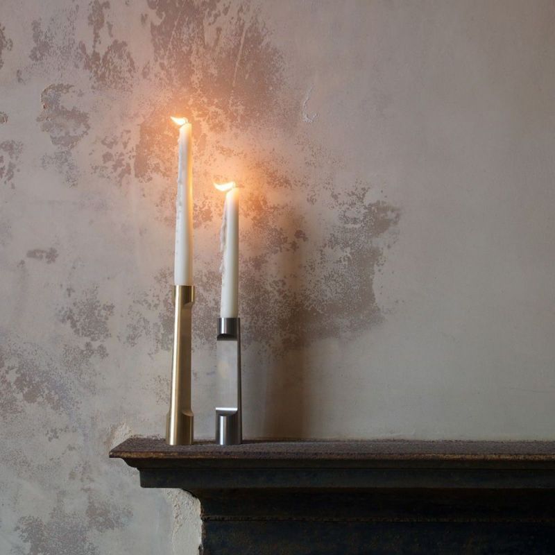 industry candle holders styled in an interior