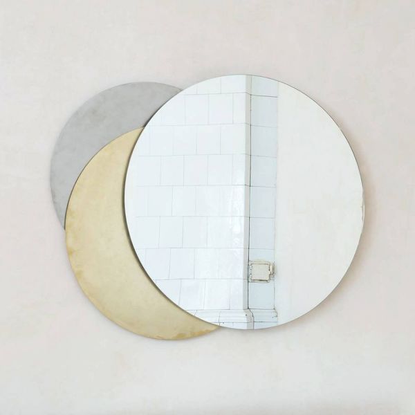 Eclipse mirror wall light by Rooms on white background