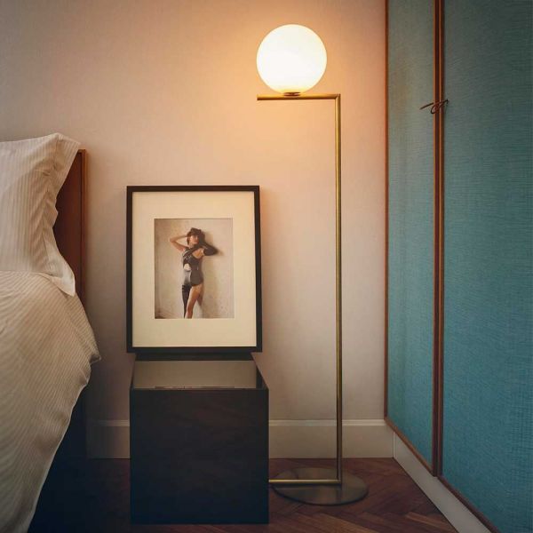 flos ic floor lamp in a bedroom