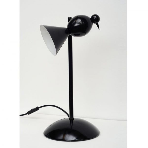 alouette desk lamp sryled in an interior by areti