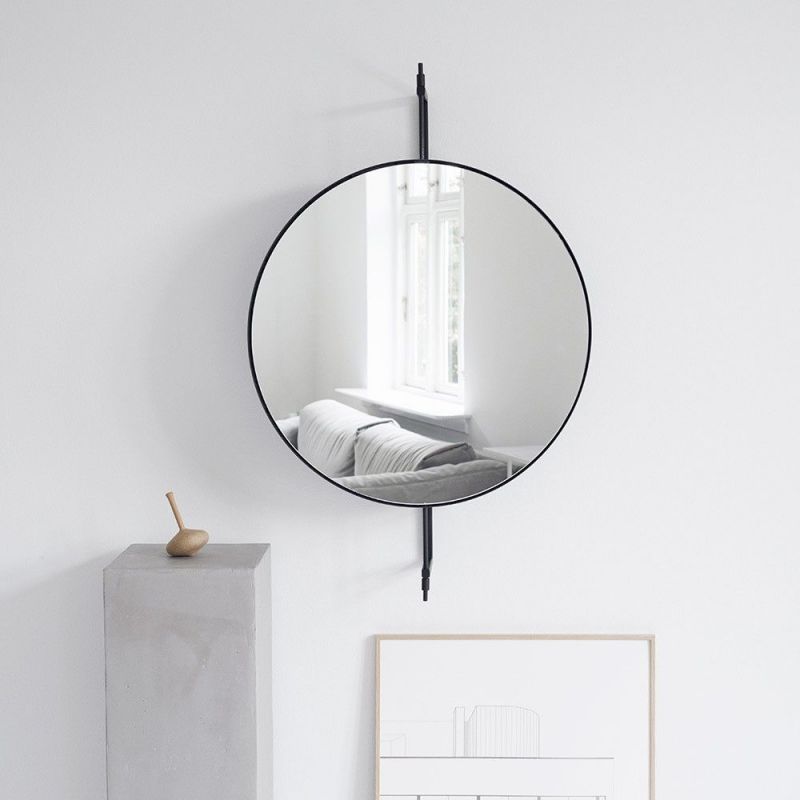 black rotating wall mirror by kristina dam