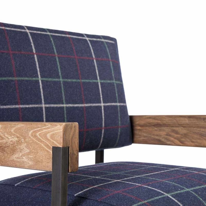 arms armchair styled in an interior by charlotte besson oberlin