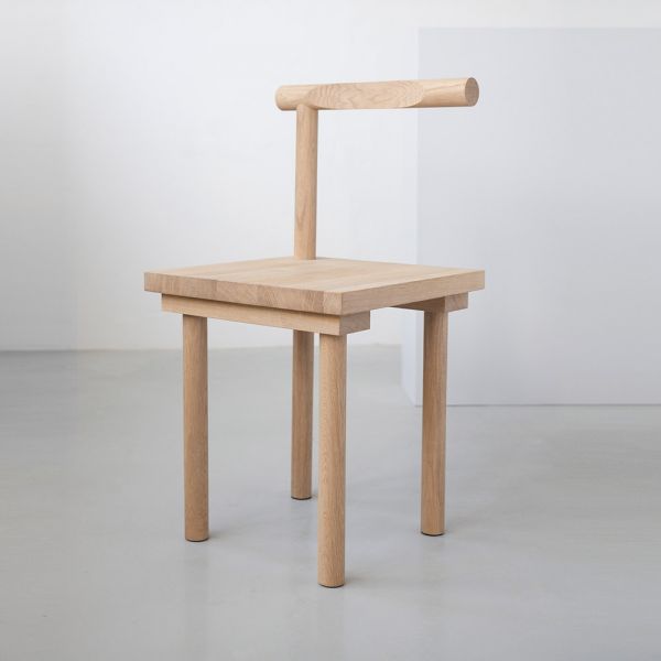 Sculptural chair by Kristina Dam grey background