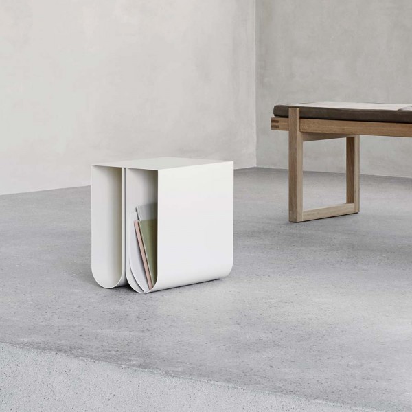 white curved side table by Kristina Dam