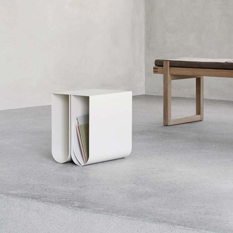 white curved side table by Kristina Dam