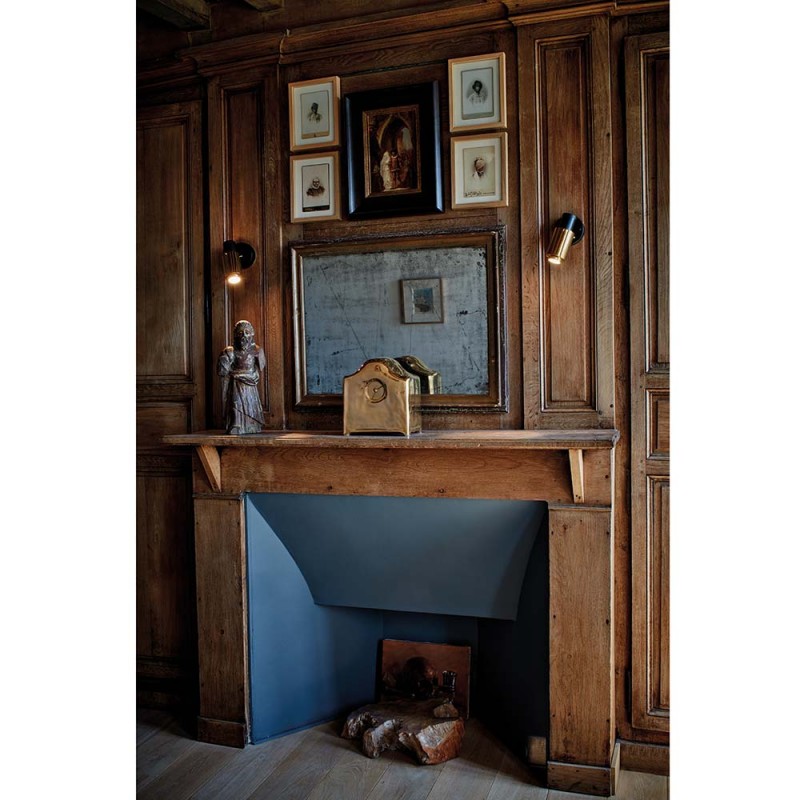 biny spot wall lamp on a chimney