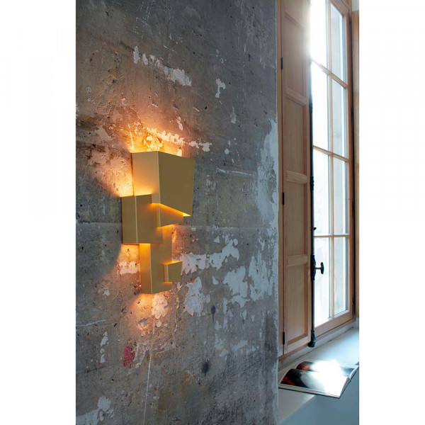 Map 1 wall light by DCW Editions styled against a concrete background