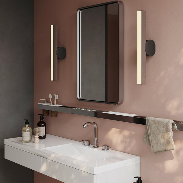 IP Calee Wall Light vertical graphite and brass in the bathroom